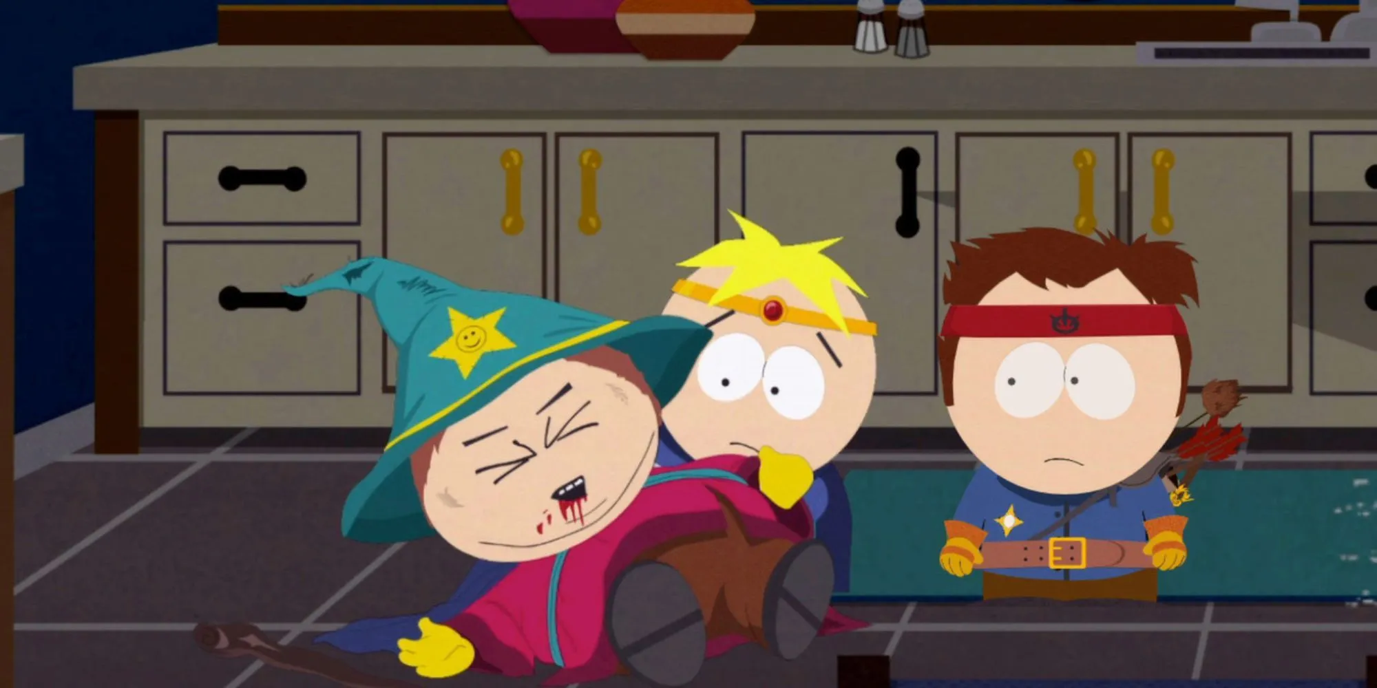 Butters và Stan đứng xung quanh Cartman bị đánh bầm dập trong South Park: The Stick of Truth