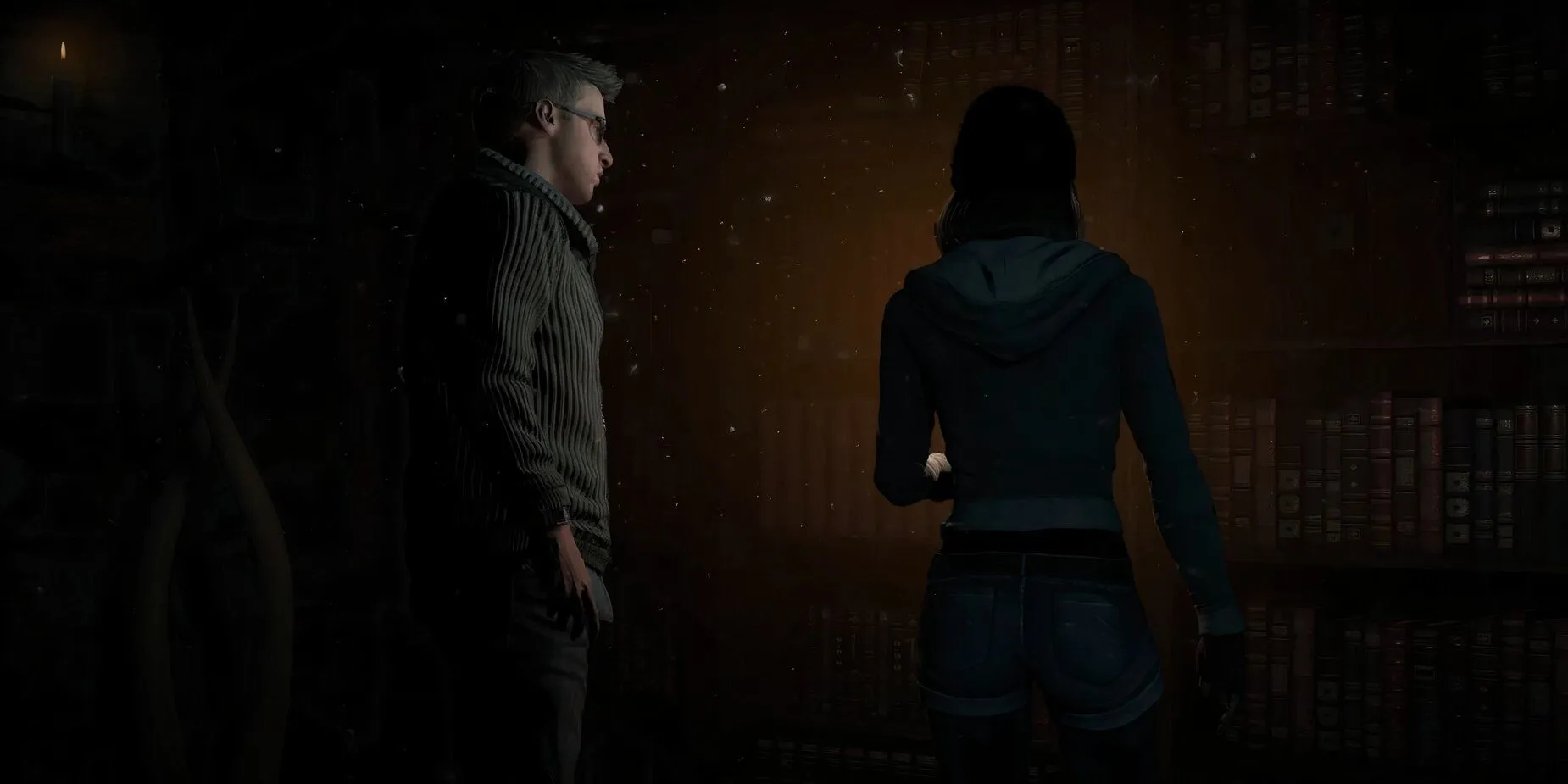 Các nhân vật trong game Until Dawn đứng trước một tủ sách trong một cảnh gameplay