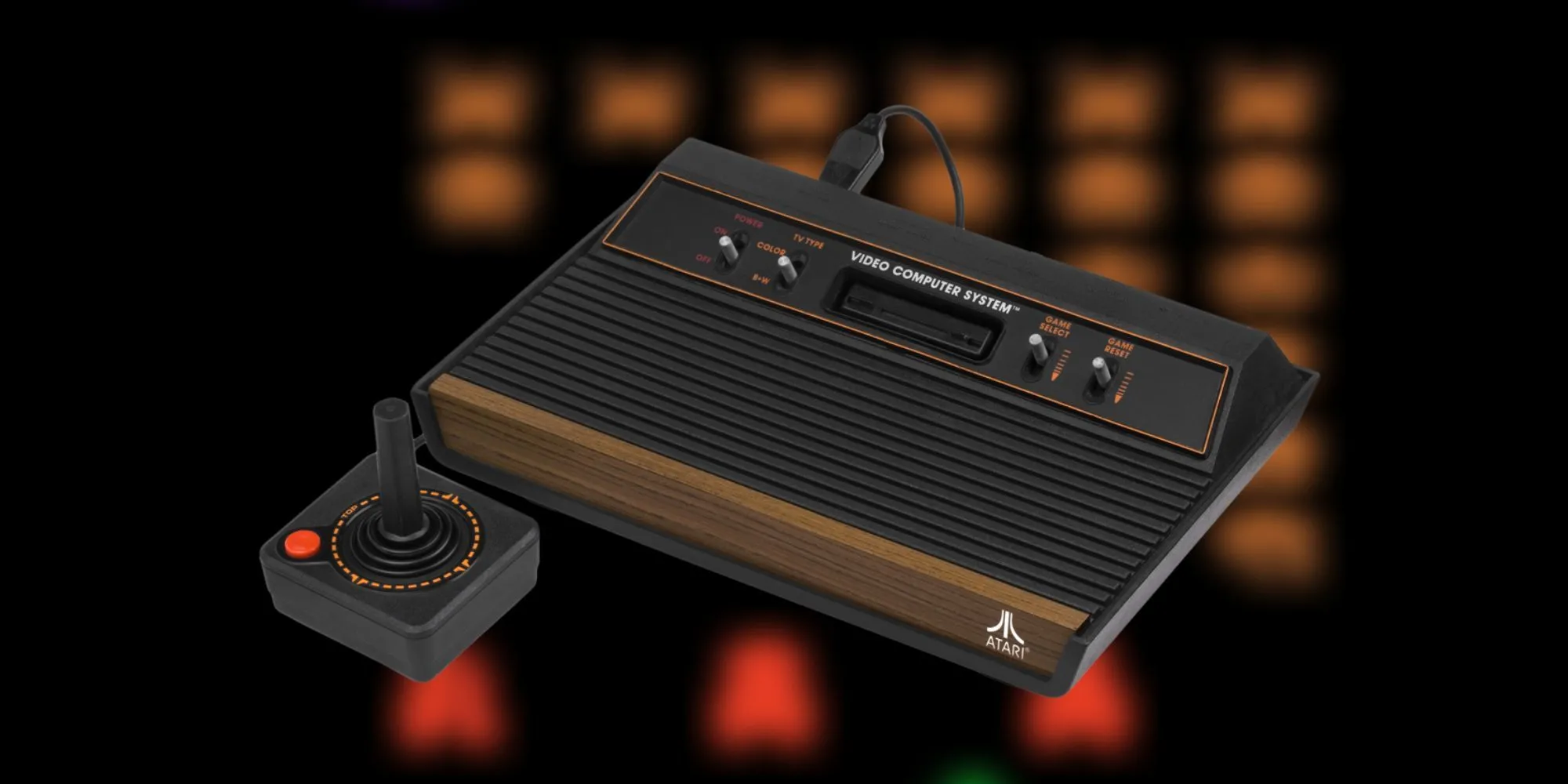 Hệ máy console cổ điển Atari 2600 với thiết kế mặt gỗ và joystick