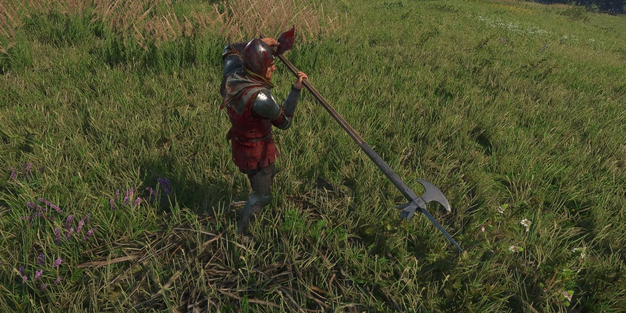 Henry cầm Rìu Chiến Balshanka trên vai trong Kingdom Come Deliverance 2
