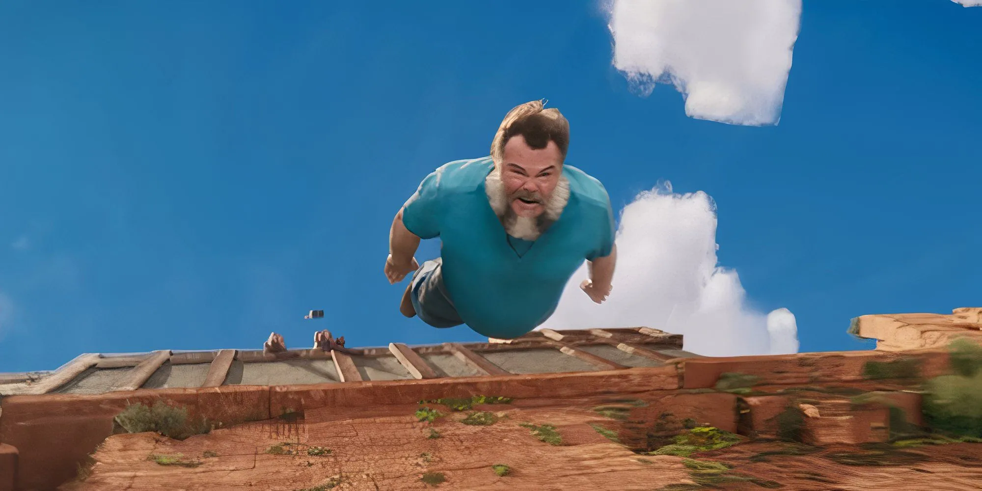 Jack Black trong vai Steve bị ngã trong một cảnh phim A Minecraft Movie