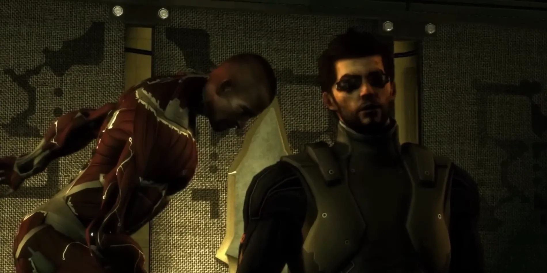 Jaron Namir, một nhân vật phản diện trong Deus Ex Human Revolution, đang trong tư thế chiến đấu với bộ phận máy móc trên người