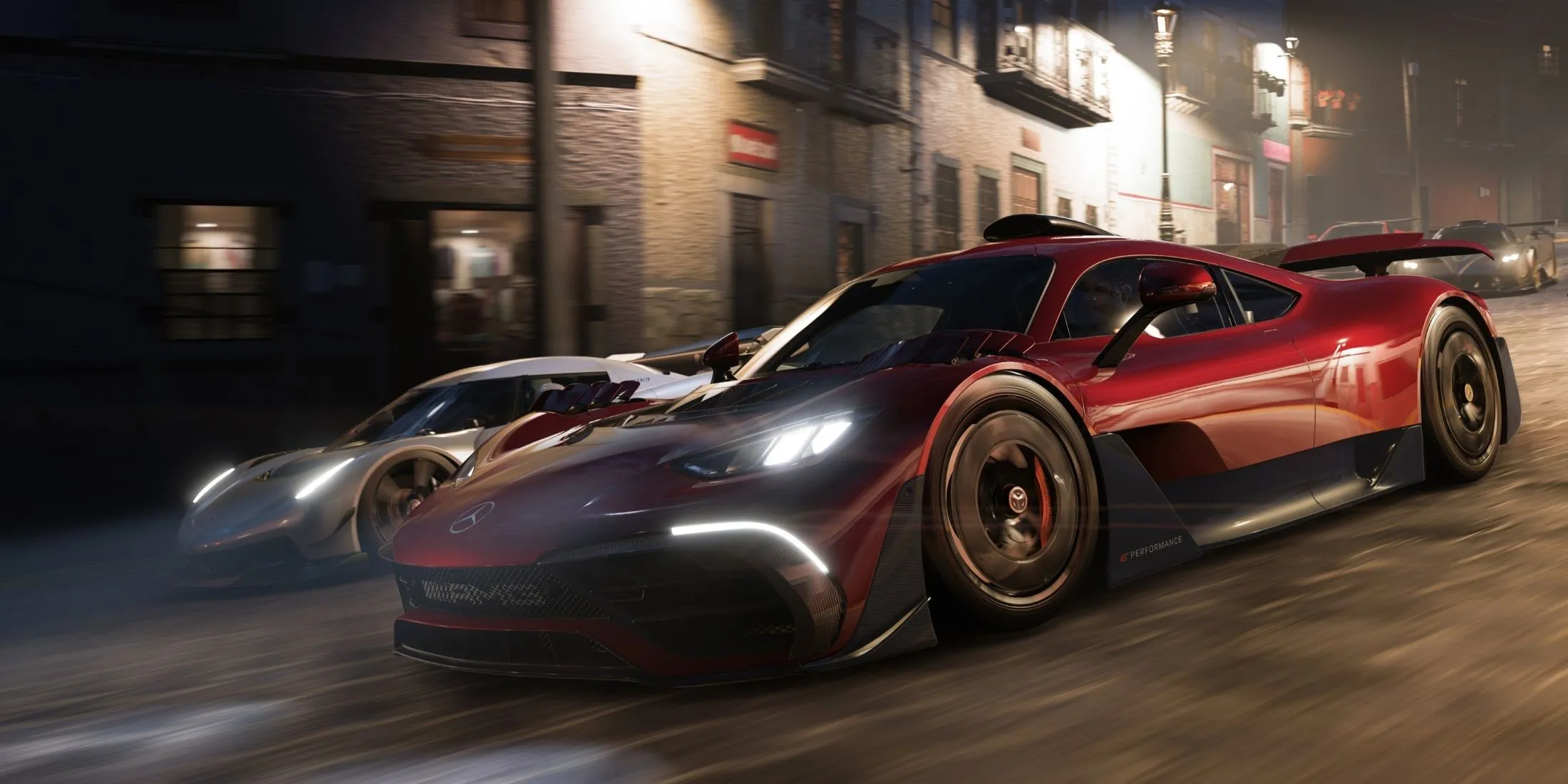 Khung cảnh núi lửa hùng vĩ và chiếc xe đua băng qua địa hình Mexico trong Forza Horizon 5, minh họa cho thế giới mở rộng lớn.
