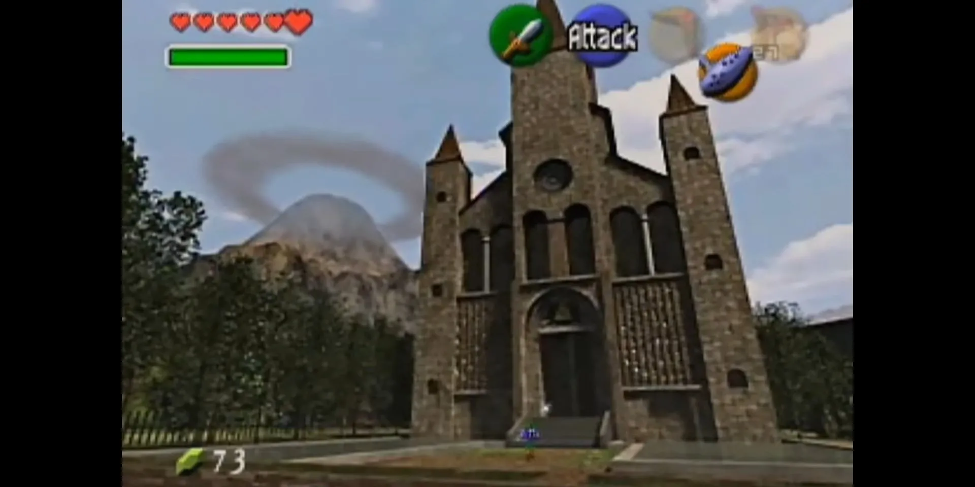 Link đứng trước Đền Thời Gian hùng vĩ trong The Legend of Zelda: Ocarina of Time, phía xa là Núi Tử Thần