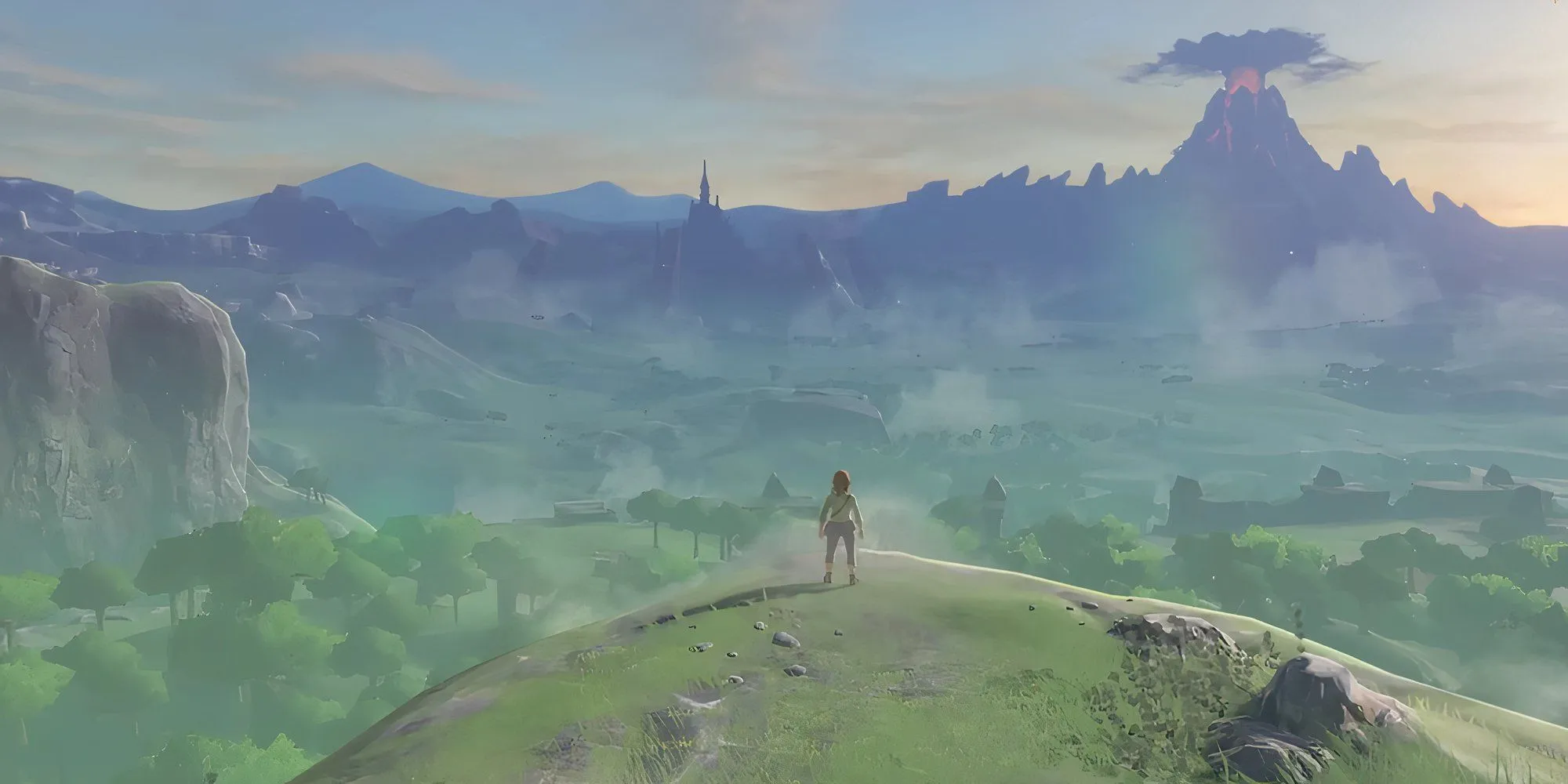Link trong The Legend of Zelda: Breath of the Wild đứng trên vách đá quay lưng về phía người xem