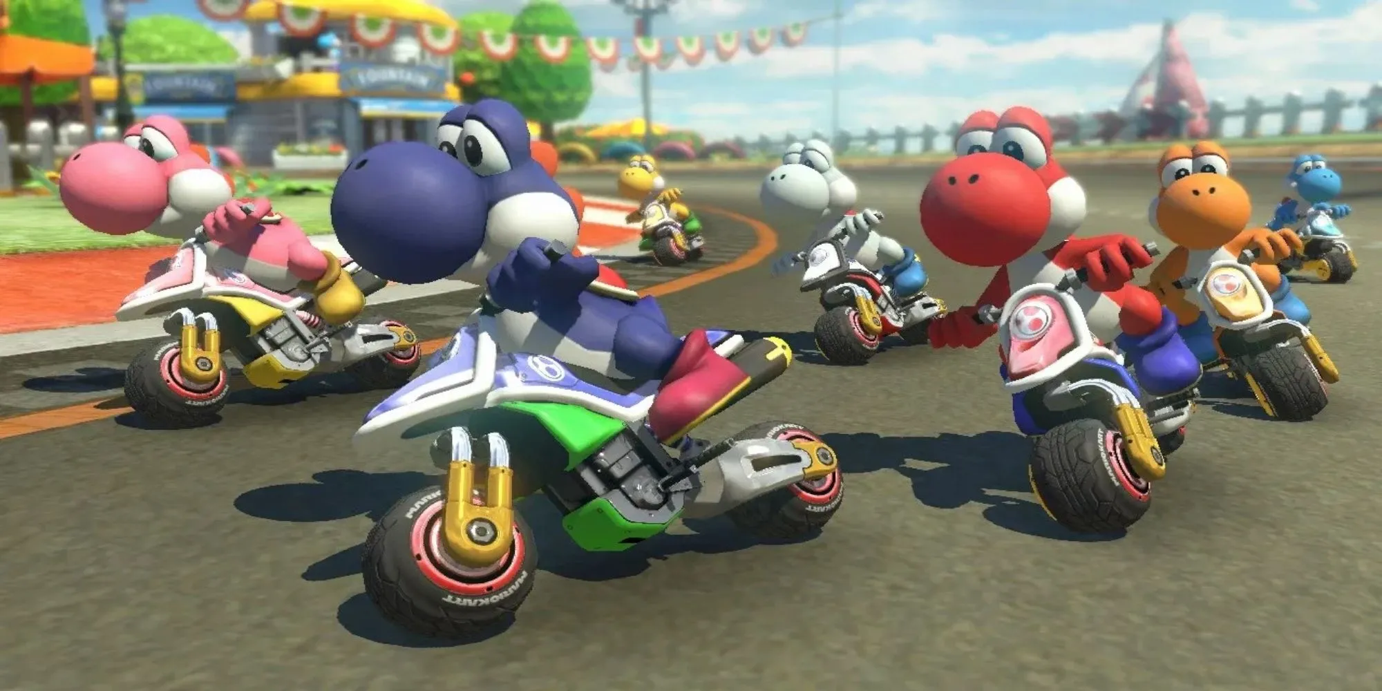 Mario và các nhân vật khác đang đua xe trong game Mario Kart 8 Deluxe đầy màu sắc