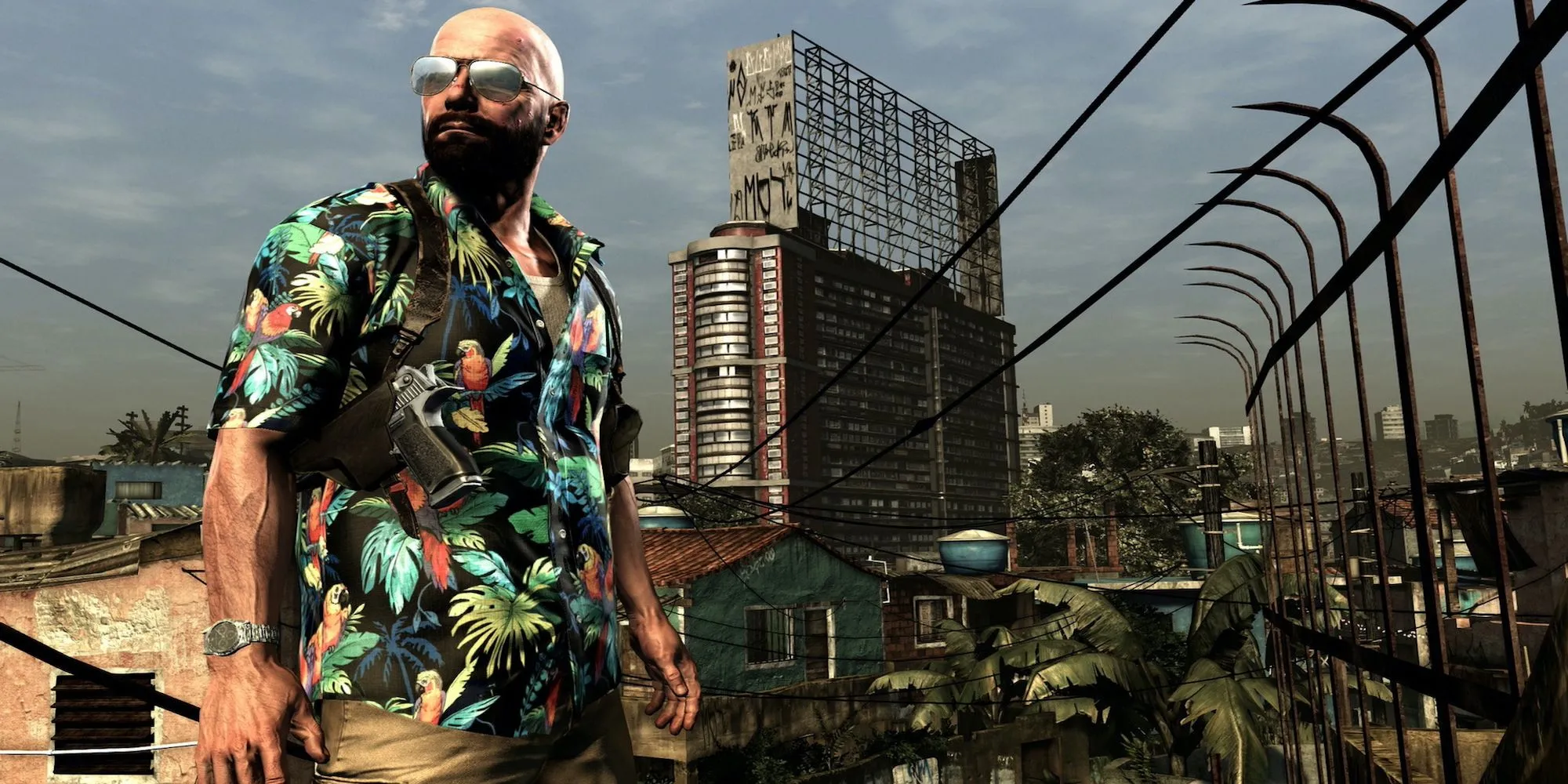 Max Payne nhìn xuống thành phố São Paulo, Brazil từ trên cao, phản ánh không khí u ám và căng thẳng của Max Payne 3.