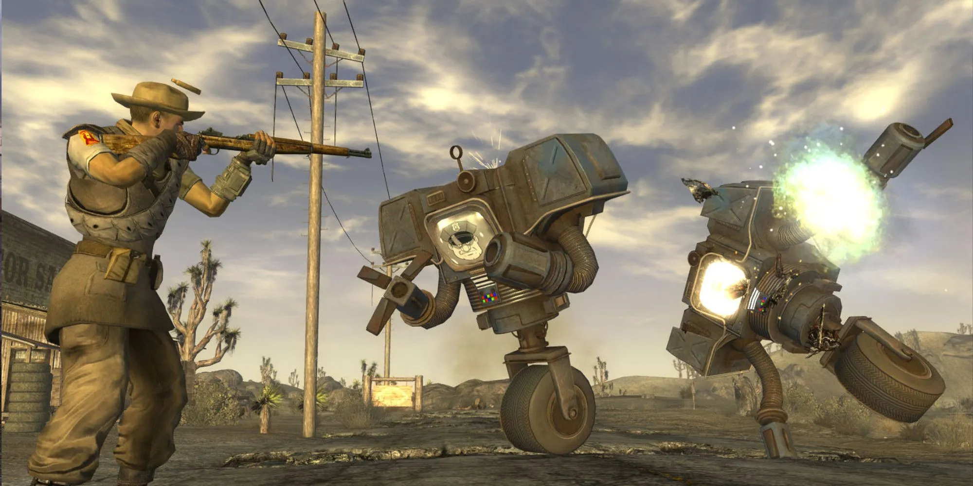 Nhân vật trong Fallout New Vegas chĩa súng vào các robot