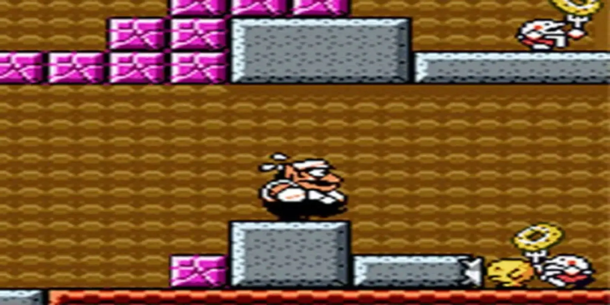 Wario thực hiện hành động trong Wario Land 3 trên Game Boy Color