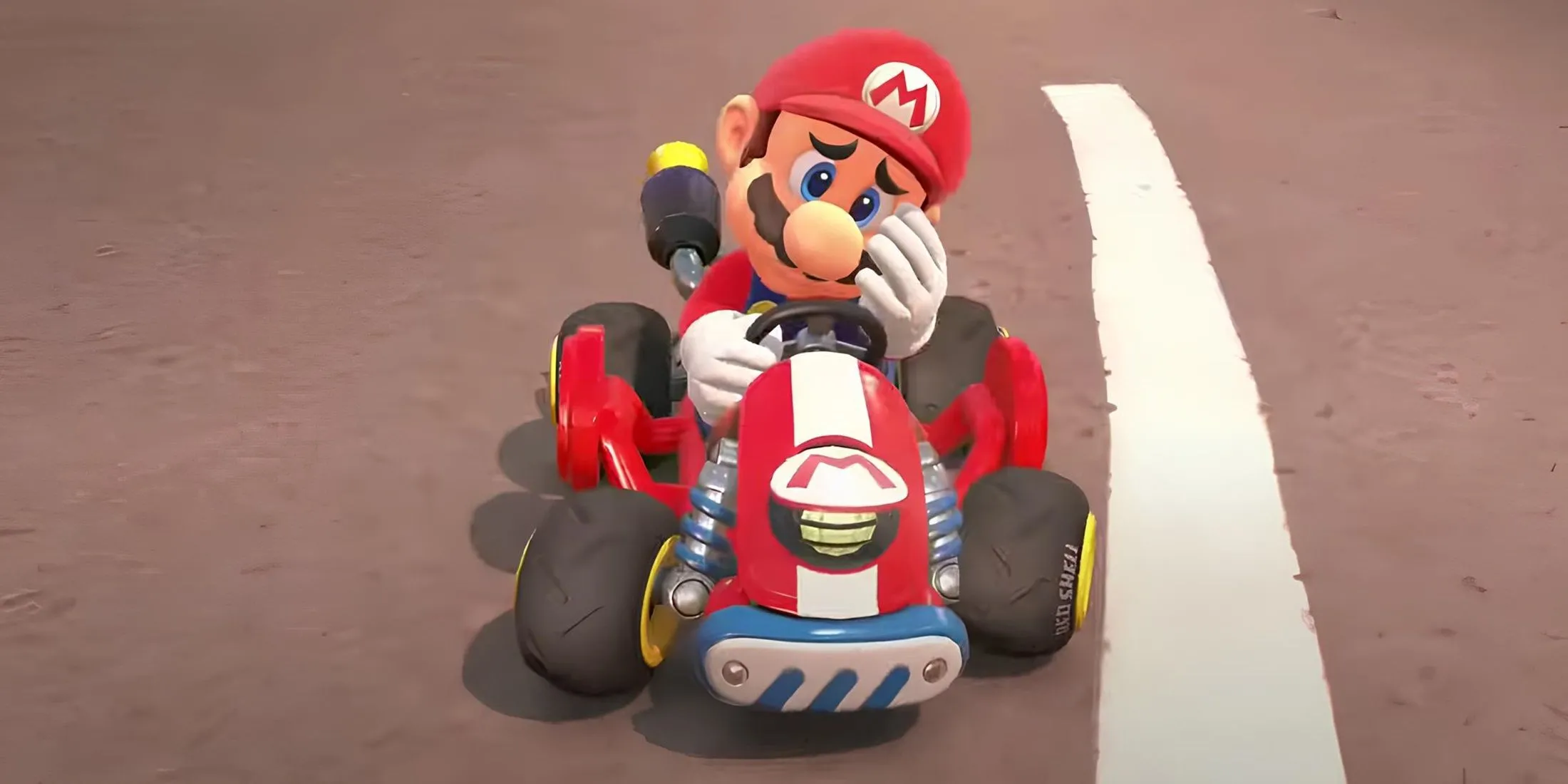 Mario buồn bã sau cuộc đua trong Mario Kart World
