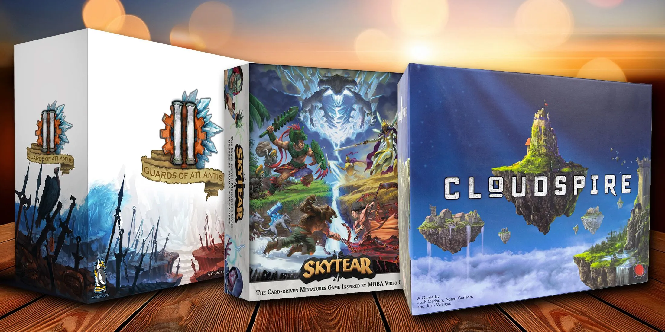 Bàn chơi game Cloudspire, Guards of Atlantis II, và Skytear được chuẩn bị sẵn, minh họa các game chiến thuật MOBA.